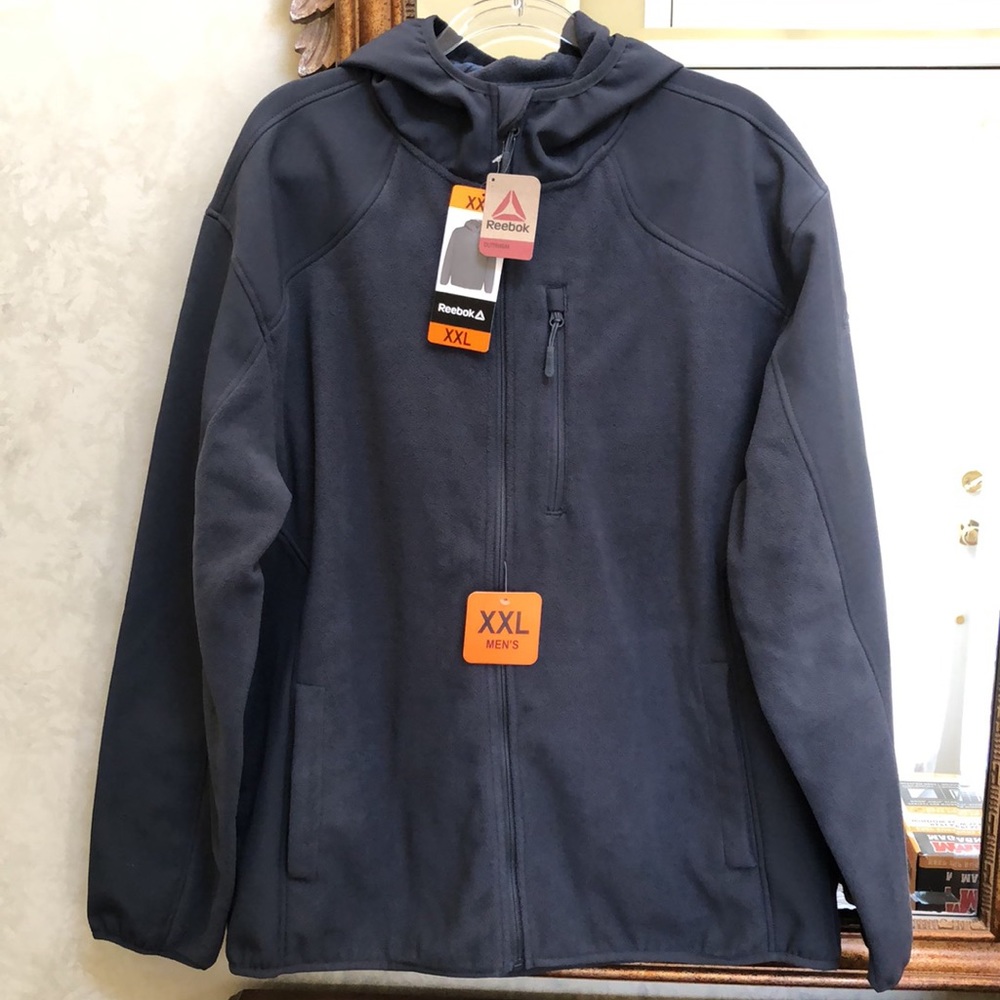New Men’s Reebok mixed media gray jacket with hood.  Size XXL.
